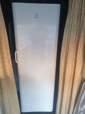 Image 1 of Tall Indesit freezer, nice and clean condition. Delivery