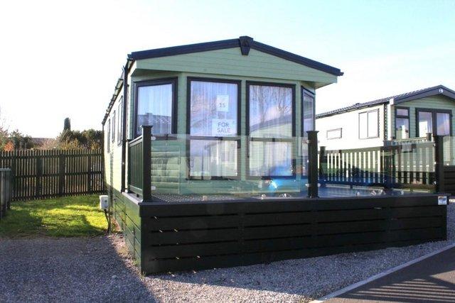 Preview of the first image of REDUCED: New static caravan on Violet Bank with great views.