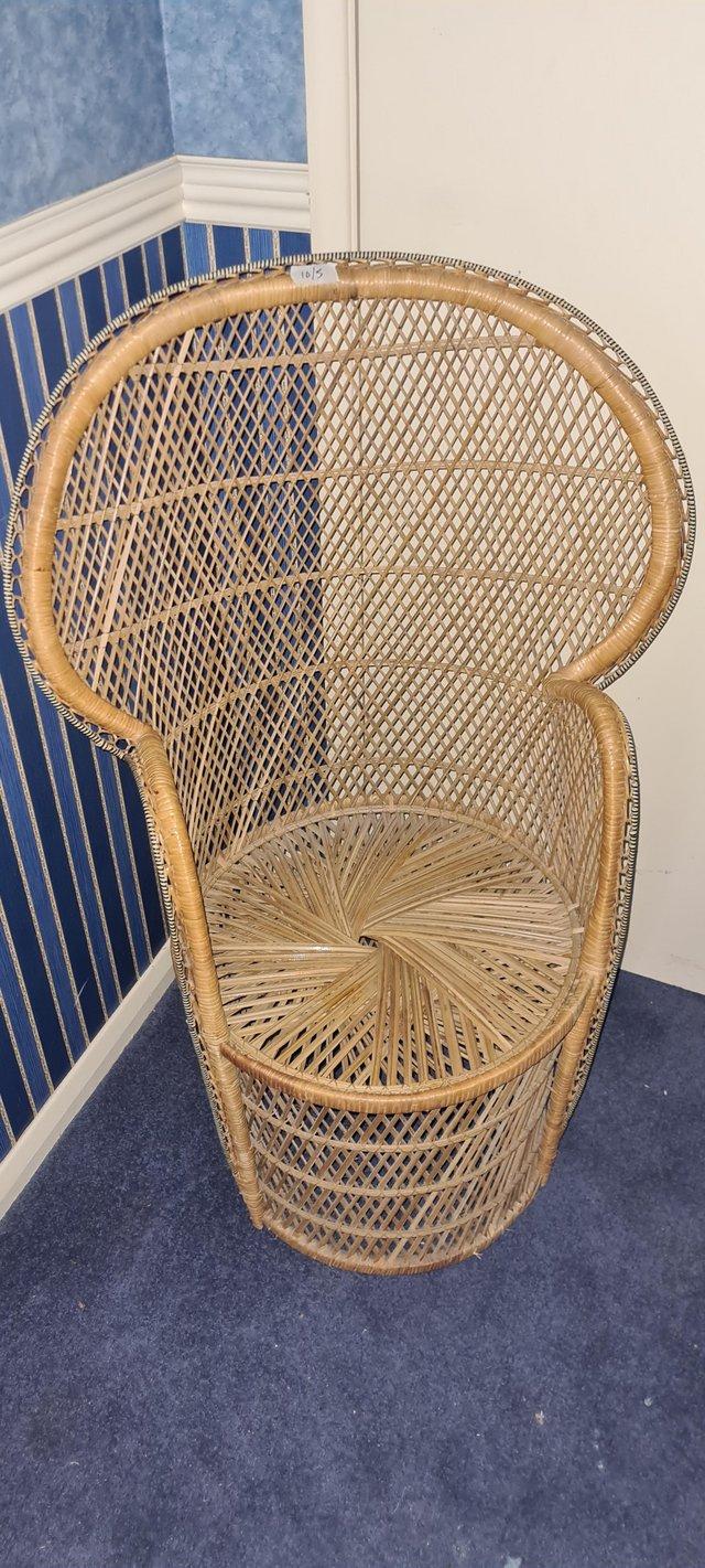 Preview of the first image of High backed wicker chair.