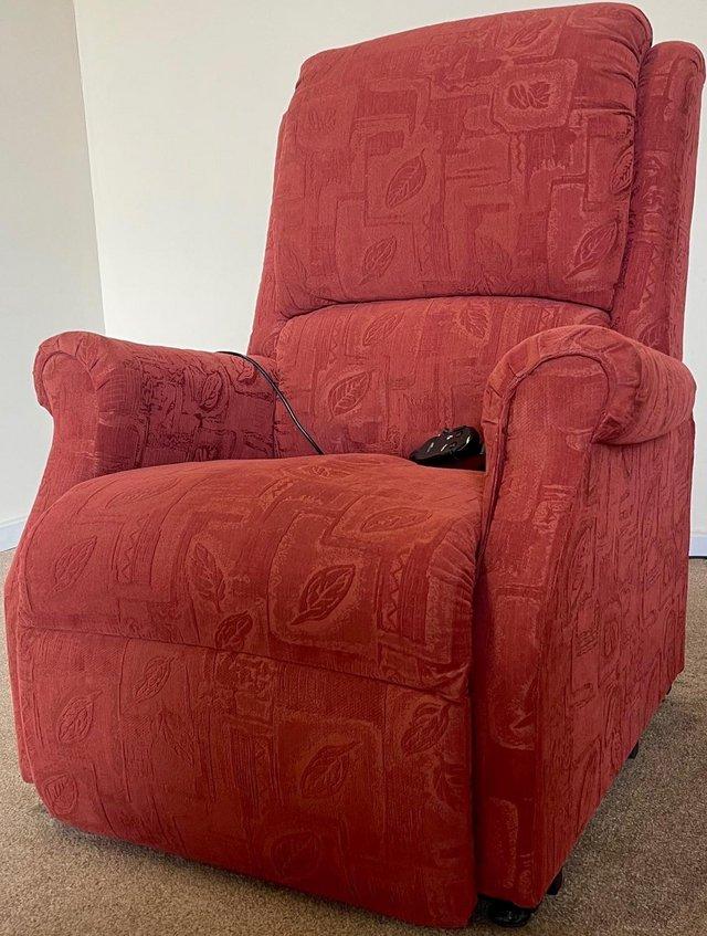 Preview of the first image of RESTWELL LUXURY ELECTRIC RISER RECLINER RED CHAIR ~ DELIVERY.
