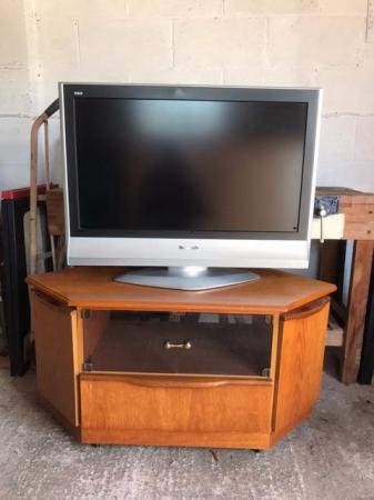 Image 1 of Panasonic 32" tv with remote and heavy wood media unit