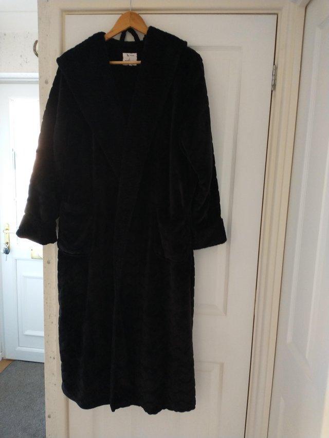 Preview of the first image of Women's winter dressing gown with hood.