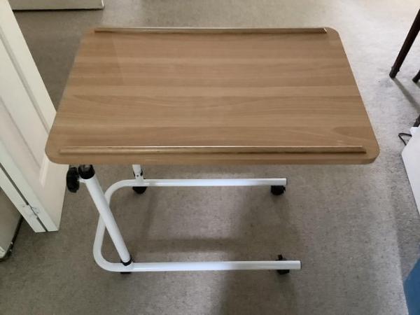 Image 1 of Over the bed trolley with adjustable height.