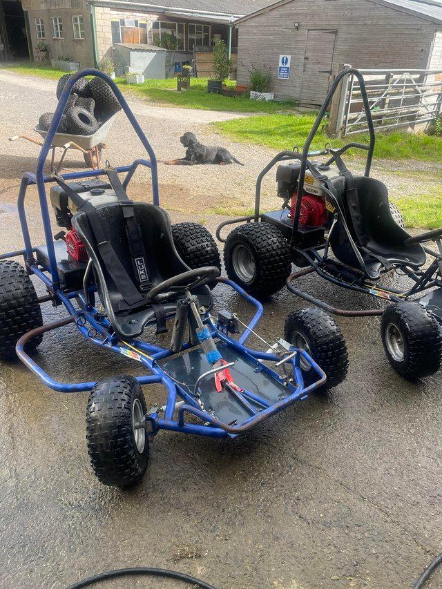 Preview of the first image of 2 MudBlasters (all terrain go carts) with Honda engines.