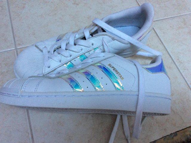 Preview of the first image of Adidas Superstar  trainers size 4.