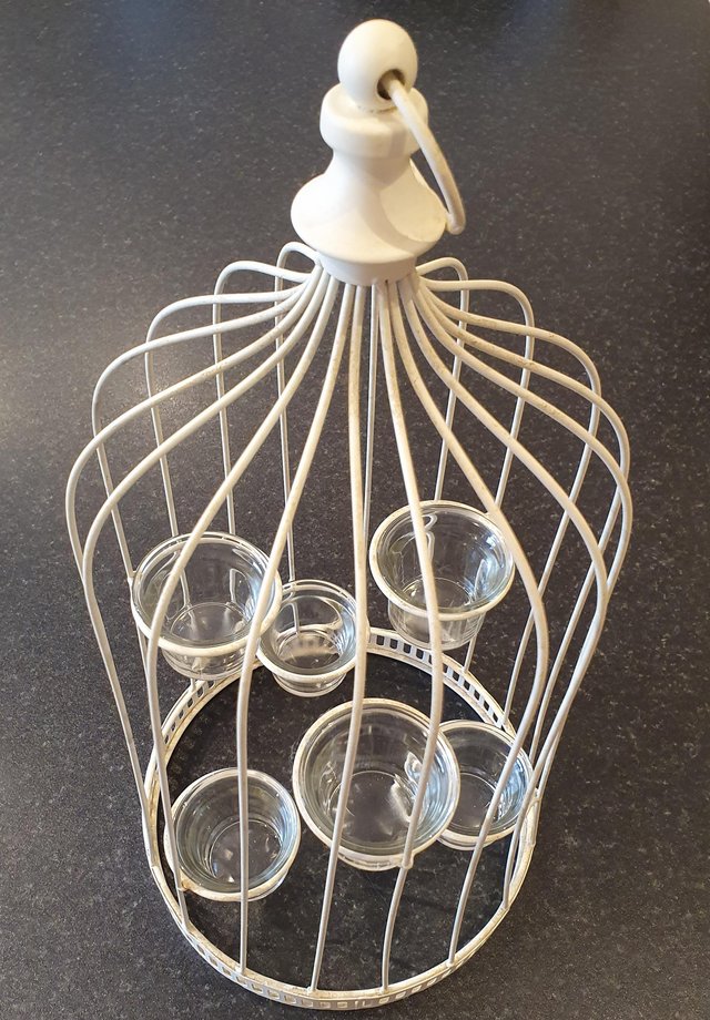 Preview of the first image of Cream Lantern with 6 removable glass tea light holders.