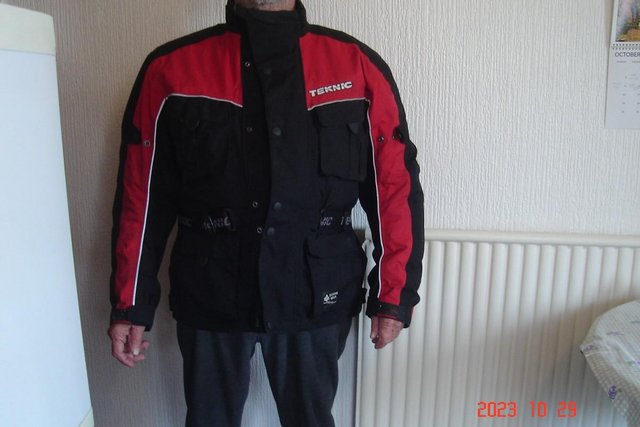 Preview of the first image of MENS MOTORCYCLE WATERPROOF COAT REMOVBLE LINNING AND ARMOUR.