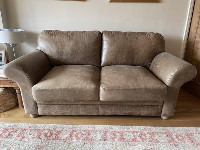 Preview of the first image of Large Brown Leather Sofa.