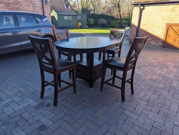 Image 2 of Dining table and 4 bar chairs with extension leaf