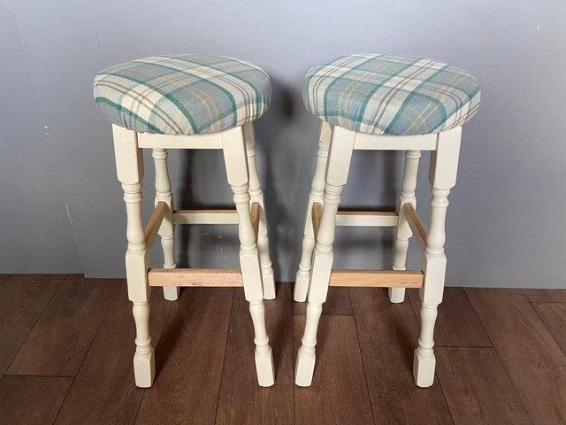 Preview of the first image of Solid wood high stools in excellent condition.