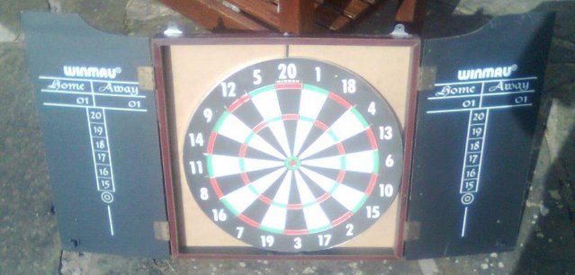 Image 1 of pre-owned dart board in wood cabinet-better than picture!