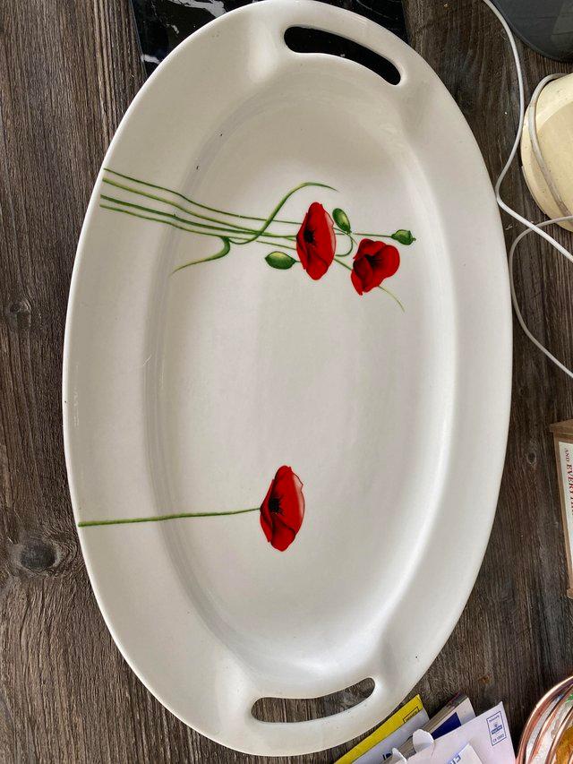 Preview of the first image of Poppy design ceramic serving tray.