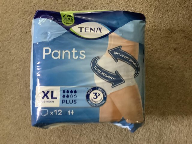 Preview of the first image of Tena Extra Large pants with soft leg trim/ very absorbent.