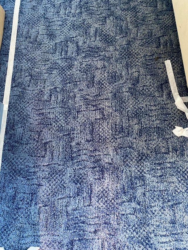 Preview of the first image of Blue thick pile, patterned bedroom carpet.
