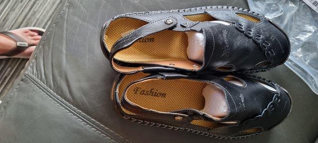 Preview of the first image of Size 13 Men's brand new sandals.