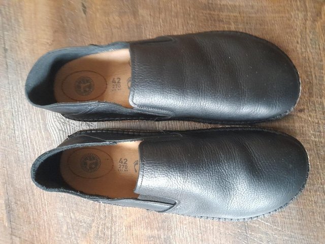 Preview of the first image of Birkenstock men's slip on shoes.