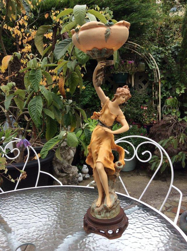 Preview of the first image of Exquisite Art Nouveau table centre piece of girl..