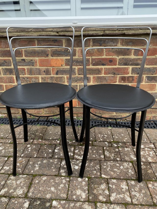 Preview of the first image of Stylish Pair of Italian Black Round Chrome Chairs.