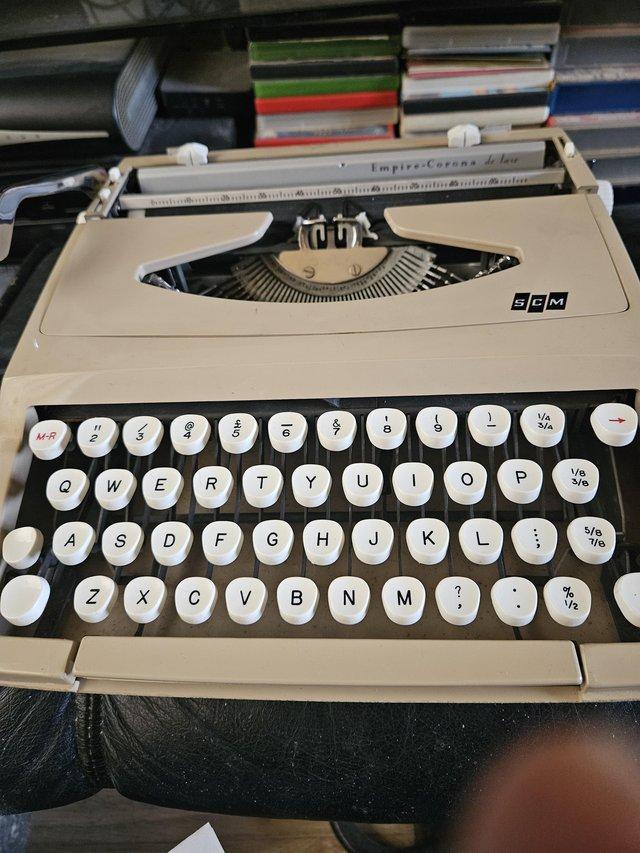 Preview of the first image of Smith Corona portable typewriter.