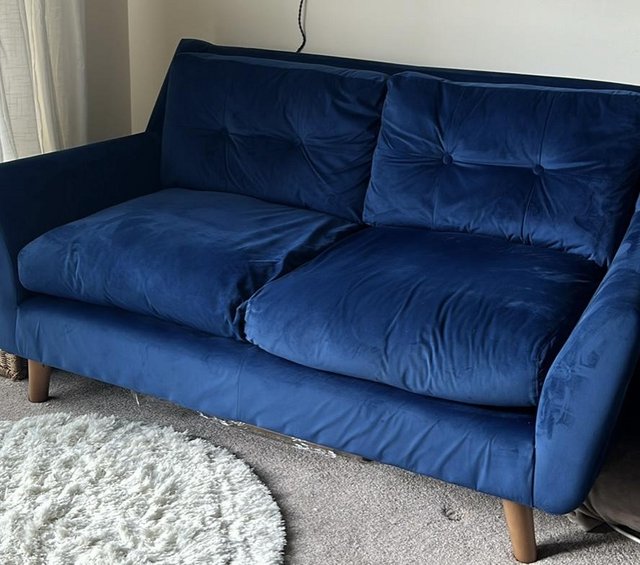 Preview of the first image of Beautiful soft velvet dark blue sofa.
