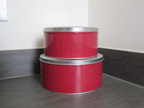 Image 3 of Two red kitchen cake tins small and medium