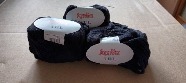 Preview of the first image of Katia tul (sole) yarn knits one scarf.