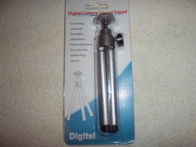 Preview of the first image of Digital Camera. 2 level Tripod. Having 2 level leg extension.