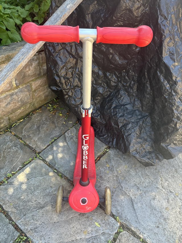 Preview of the first image of Children’s red scooter light up wheels.