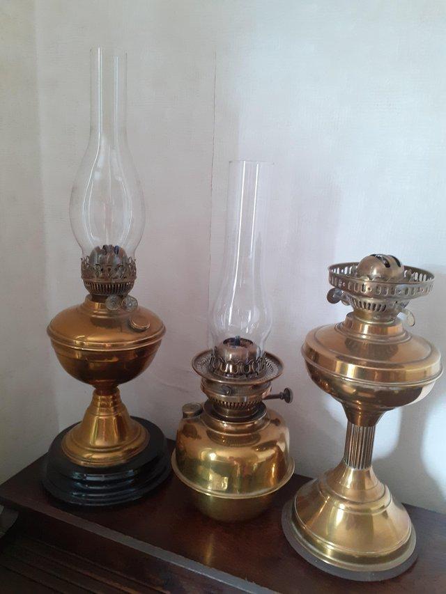 Brass oil lamps sold as three — Furniture & Homeware in Colchester