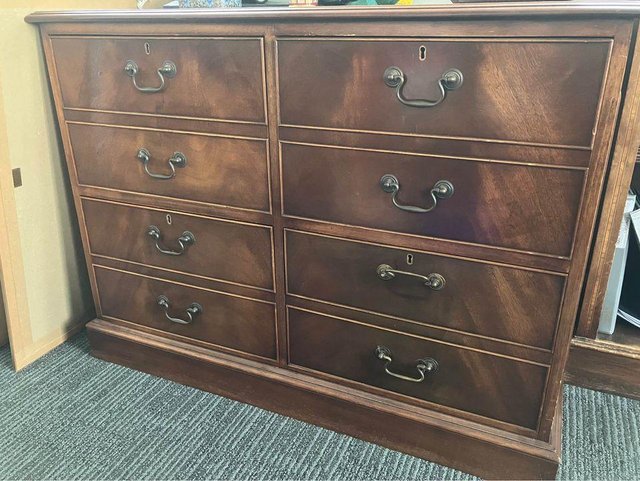 Preview of the first image of Antique reproduction four drawer lockable cabinet with leath.