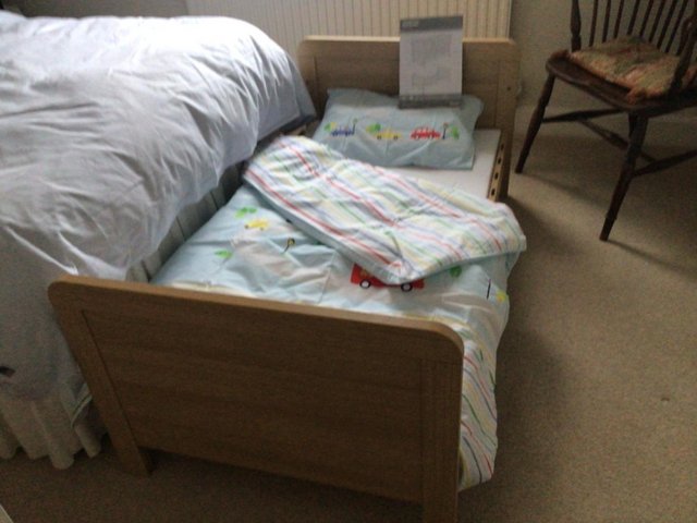 Preview of the first image of Mamas & Papas cot/first bed - only used a few times when.