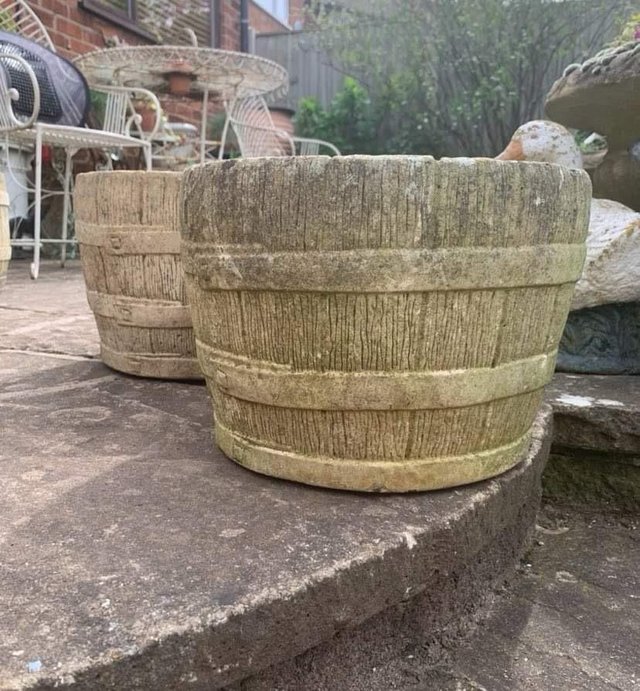Preview of the first image of 2 heavy Cotswold Stone plant pots.