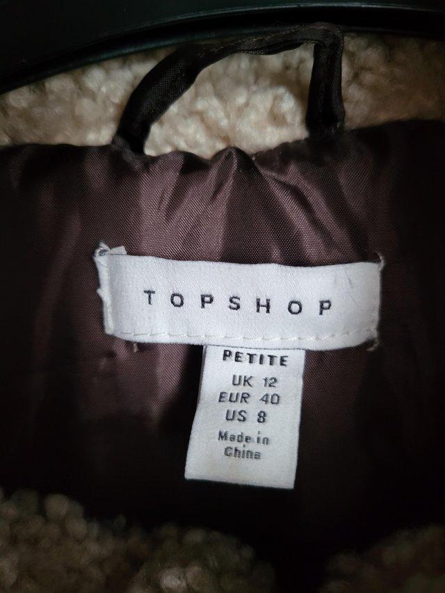 Preview of the first image of Topshop petite teddy coat size 12 new.