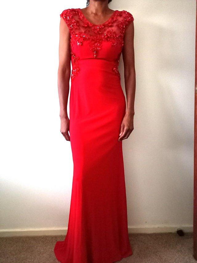 Preview of the first image of Long Maxi Red Dress - Sleeveless.