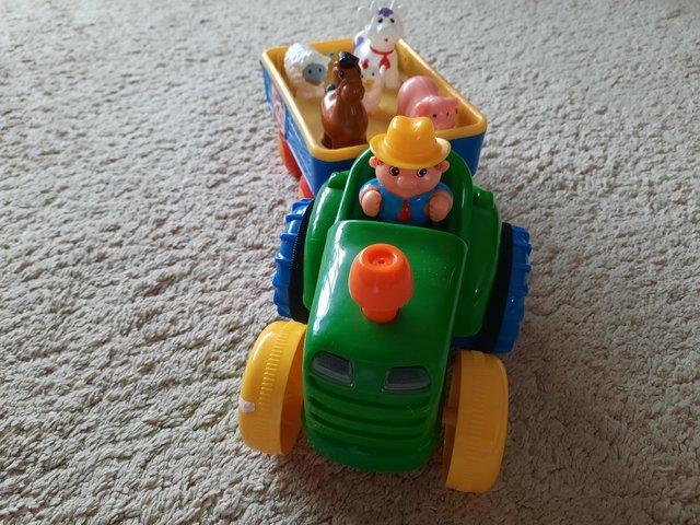 Preview of the first image of Lights and Sounds tractor in excellent condition.