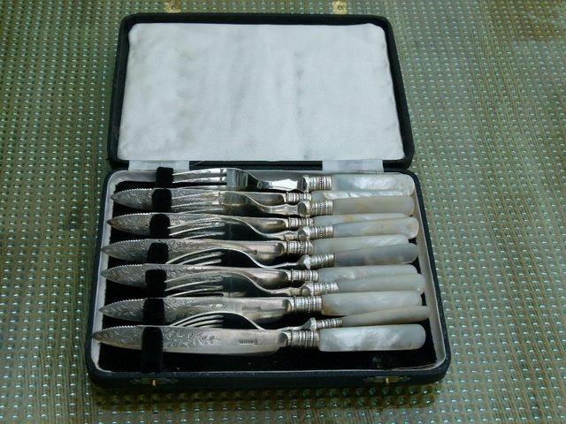 Preview of the first image of Mother of pearl set of 6 fruit knives and forks.