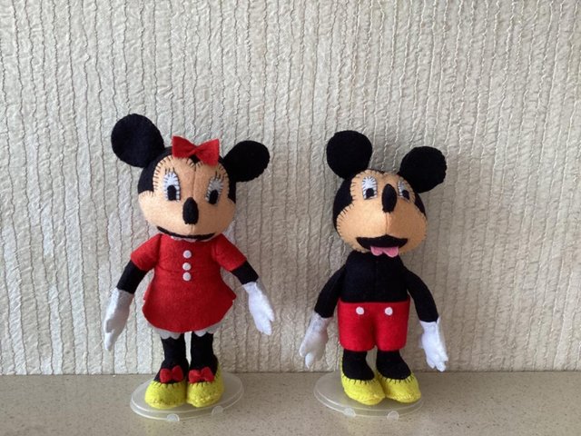 Preview of the first image of Micky and Mini mouse on a stand. 9 inch.