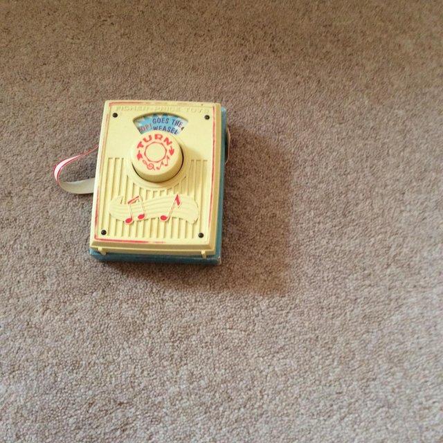 Preview of the first image of Pocket Wooden Radio 1970’s made by Fisher Price.