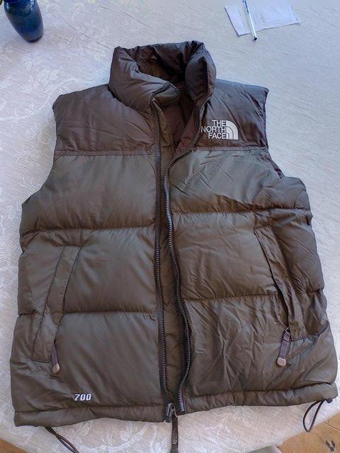 Preview of the first image of The North Face  brown  unworn gilet.