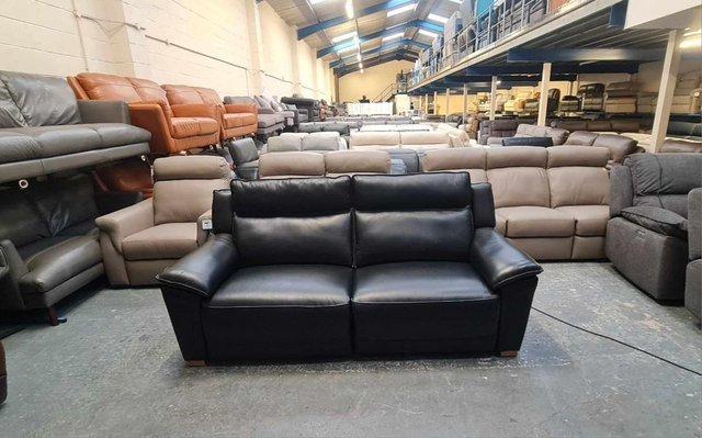 Preview of the first image of Dune black leather electric recliner 3 seater sofa.
