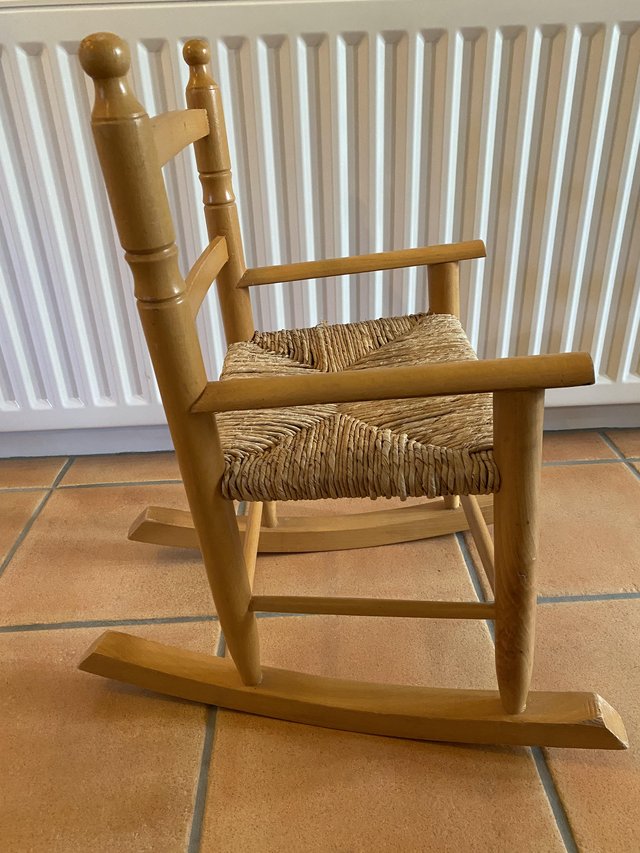 Preview of the first image of Child’s Wood & Wicker Rocking Chair.