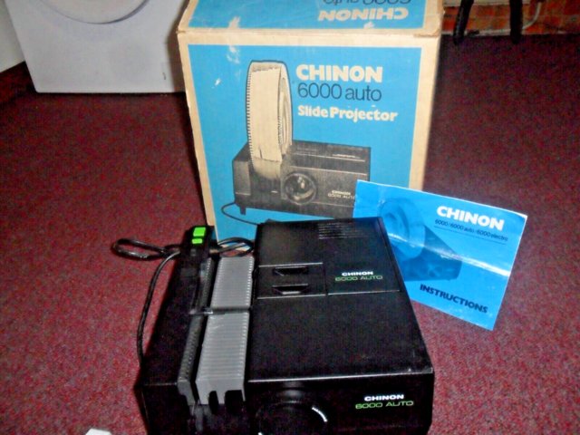 Preview of the first image of VINTAGE CHINON 6000 AUTO 35mm SLIDE PROJECTOR..
