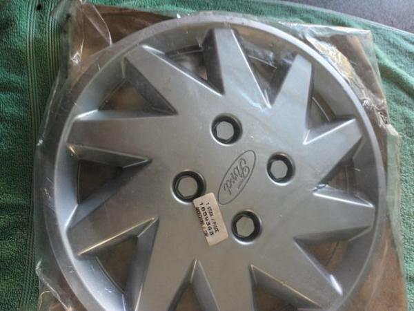Image 4 of TWO ORIGINAL FORD WHEELS TRIMS.