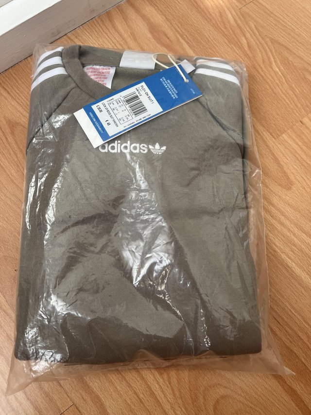 Preview of the first image of New adidas tracksuit age 2/3 yrs.