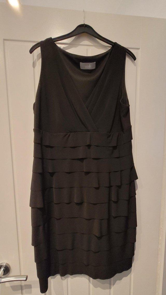 Preview of the first image of Black ruffle layer Wallis dress, size 14.