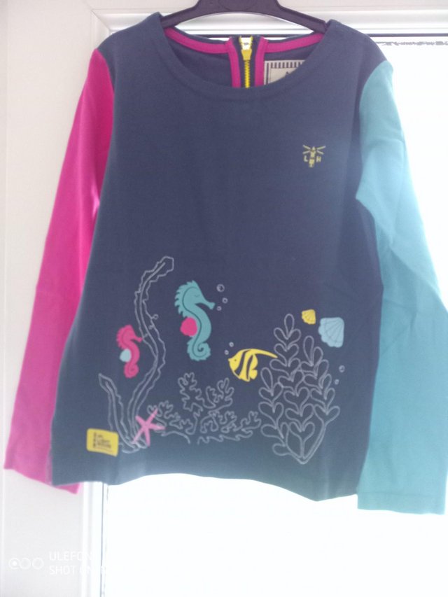 Preview of the first image of Lighthouse Seahorse Girls Top, age 7/8 yrs BNWT.