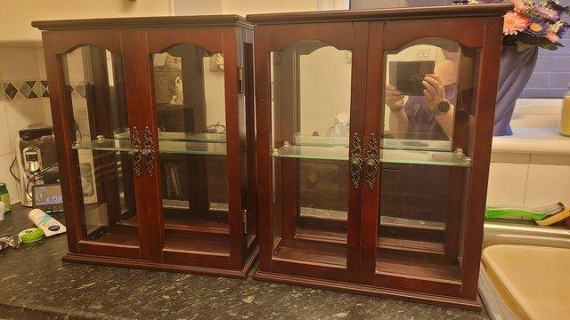 Preview of the first image of Mahogany wood & glass 19'' display cabinets X2.