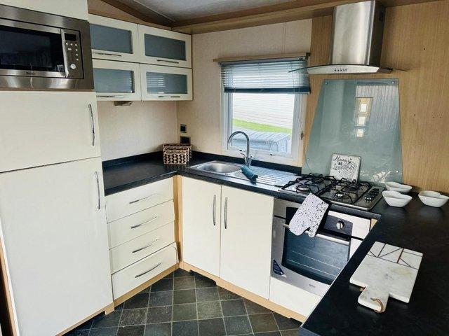 Preview of the first image of 2 bedroom caravan with French doors * Felixstowe Beach*.