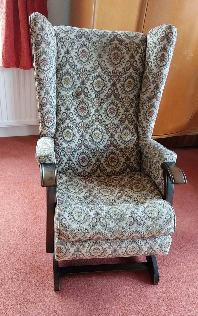 Preview of the first image of Wooden and Upholstered Rocking Chair.