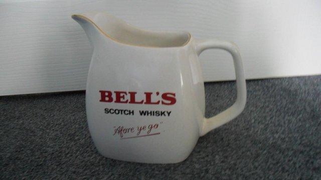 Preview of the first image of Bells Scotch Whisky Wade Jug / Pub Memorabilia.